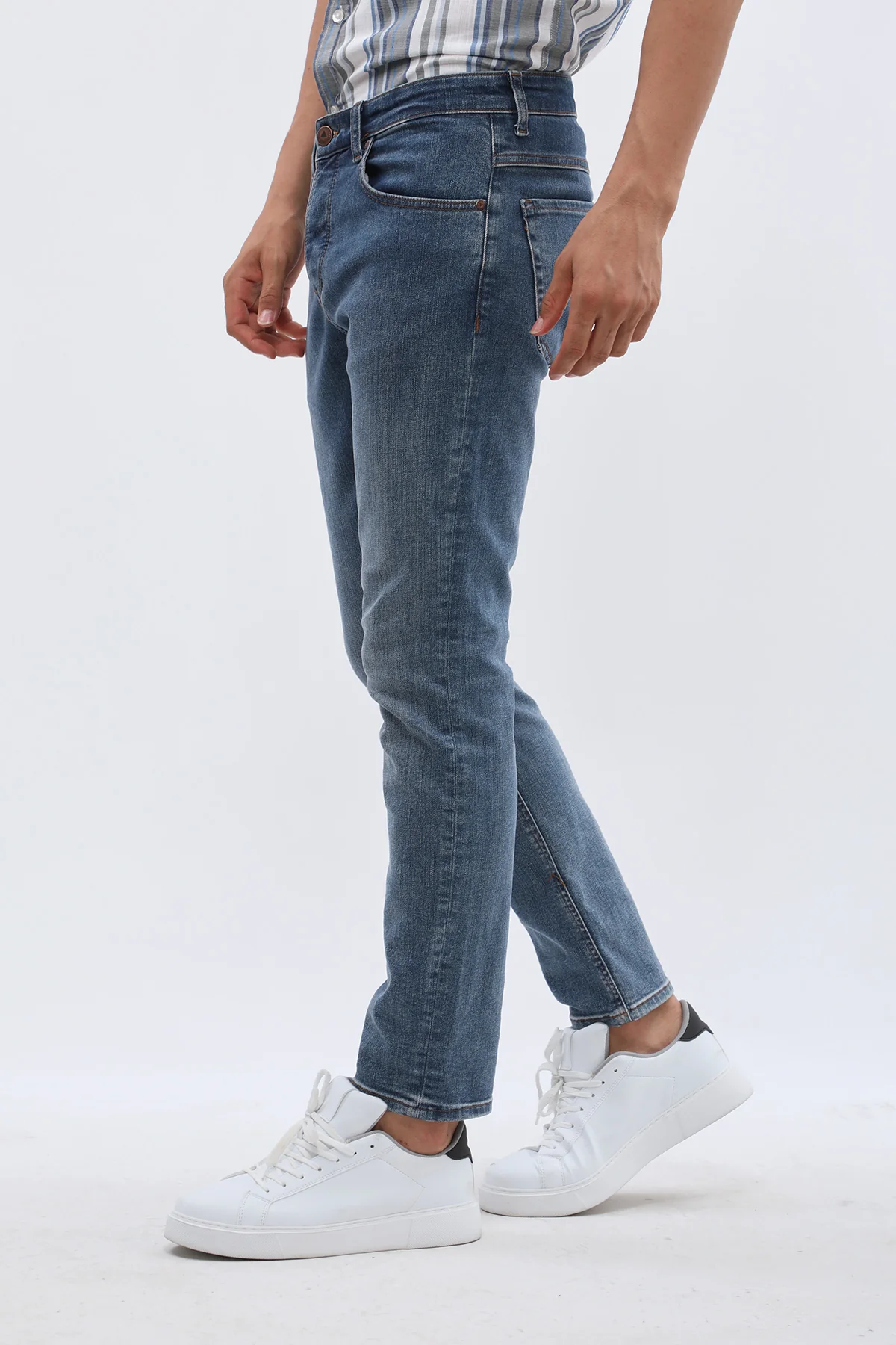 جينز Slim Fit من DNM UNITED - لون أزرق سماوي